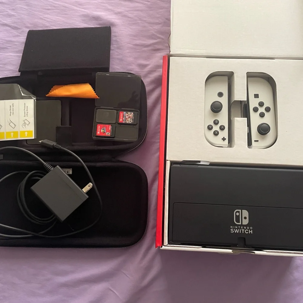 Nintendo Switch with Gray Joy-Con and Accessories